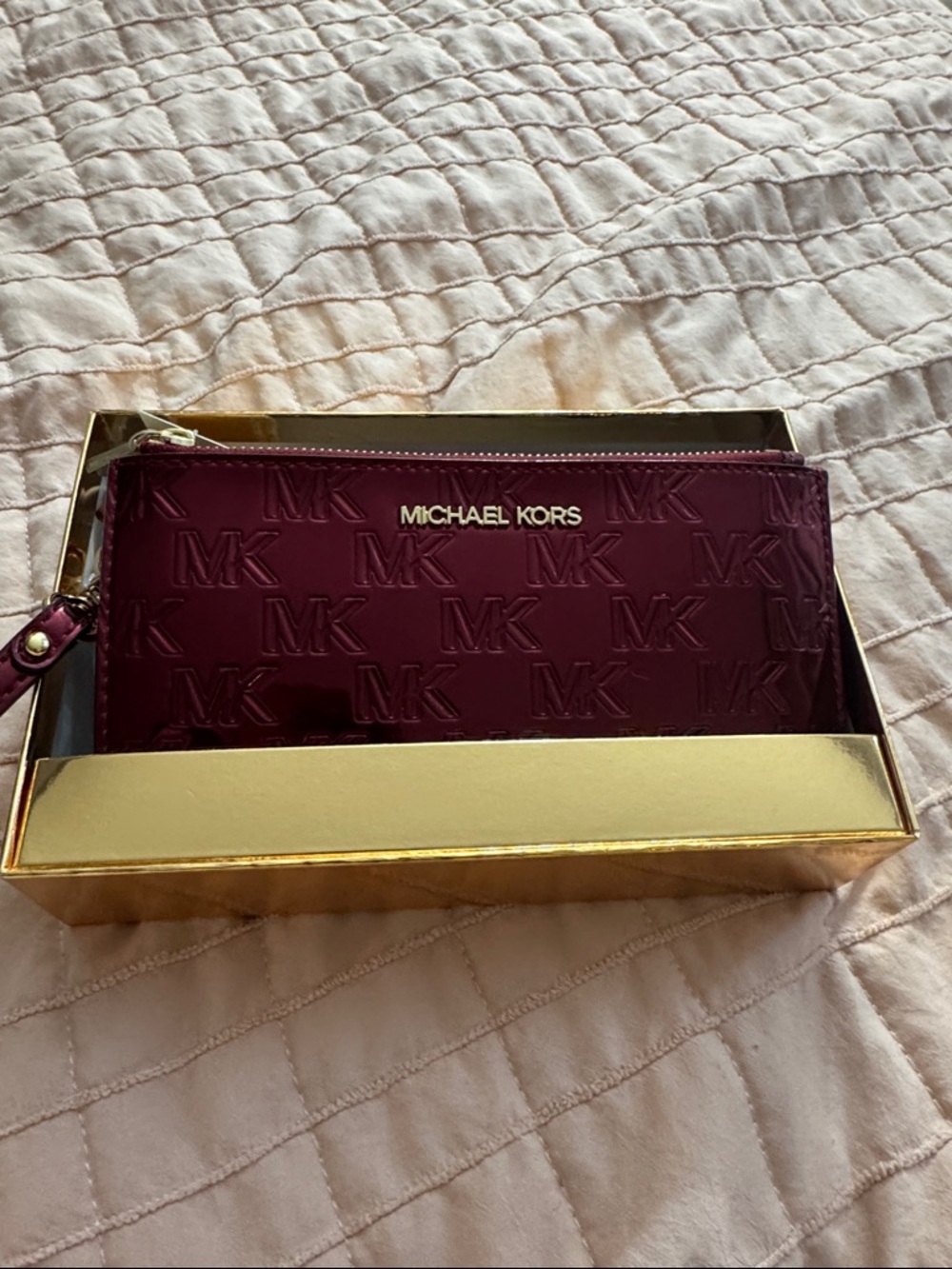 Michael Kors Deep Wine Embossed MK Wristlet with Gold Logo